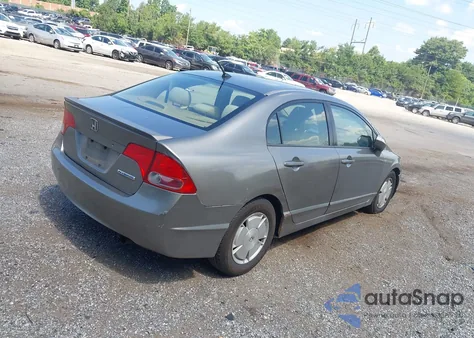 2006 Honda Civic Hybrid from USA, damaged, VIN JHMFA36216S014499